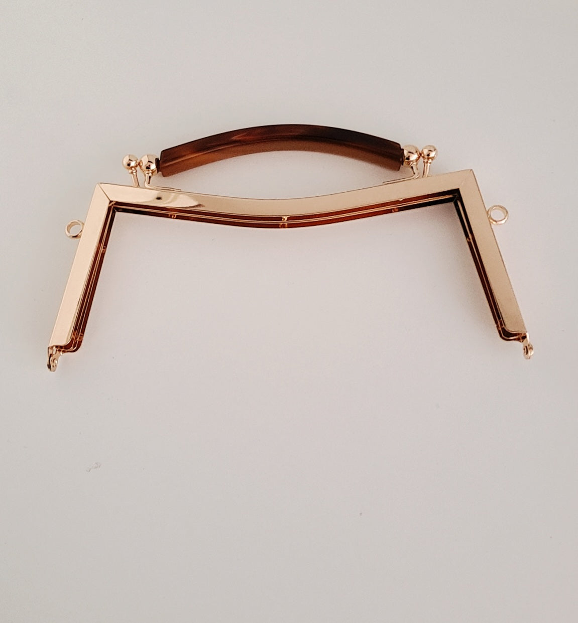 Clasp metal frame for bag making